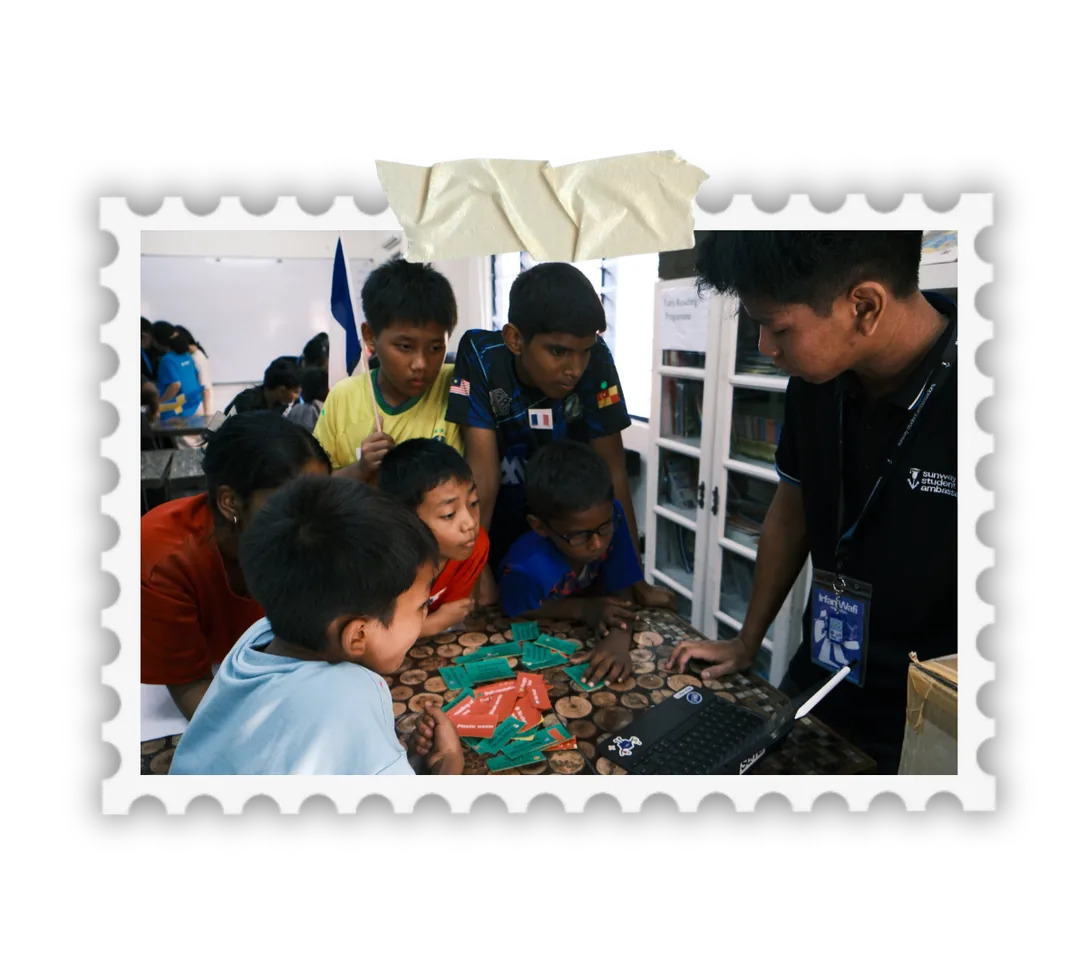 Scholars leading an SLP activity with children